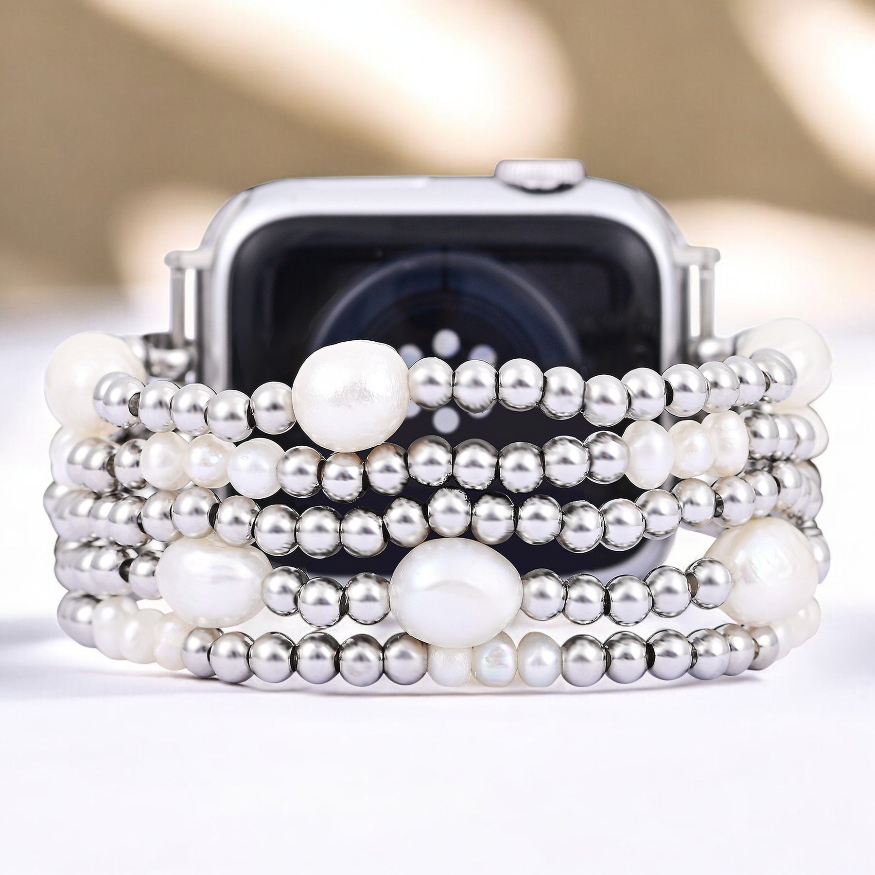 パールとシルバーのストレッチ Apple Watch ストラップ