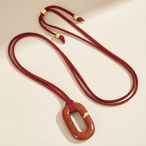 スエードレッドストーンセレニティネックレス